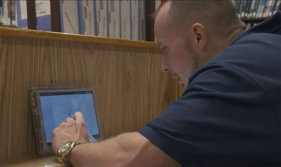 Correctional Education student studying with tablet